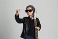 Funny rock child with guitar.little boy in sunglasses Royalty Free Stock Photo