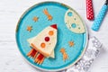 Funny sandwich with rocket and stars made of cheese, carrot and paprika, meal for kids idea