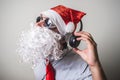 Funny santa claus babbo natale listening music Royalty Free Stock Photo