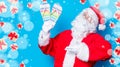 Funny Santa Claus have a fun with flip flops Royalty Free Stock Photo