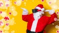 Funny Santa Claus have a joy with VR glasses Royalty Free Stock Photo