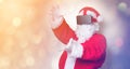 Funny Santa Claus have a joy with VR glasses Royalty Free Stock Photo