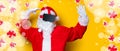 Funny Santa Claus have a joy with VR glasses Royalty Free Stock Photo