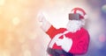 Funny Santa Claus have a joy with VR glasses Royalty Free Stock Photo