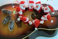 Funny santa claus toys with guitar Royalty Free Stock Photo