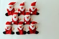 Funny santa claus toys hold tight Royalty Free Stock Photo