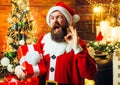 Funny Santa. ipster man, bearded Santa celebrate Thanksgiving day and Christmas.