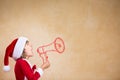 Funny Santa kid with drawn megaphone Royalty Free Stock Photo