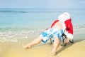 Funny Santa in shorts on the beach. Christmas in the tropics.