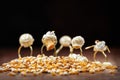Funny scene with popcorn figures on a wooden table