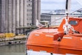 Funny seagull bird sitting on a lifeboat...