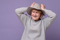 Funny senior caucasian woman remembered something and holds a hand on head