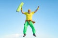 Funny Senior man Jumping. Old man jumping on blue sky background. Freedom retirement concept. Fit senior man resting Royalty Free Stock Photo