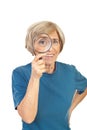 Funny senior woman with magnifier Royalty Free Stock Photo