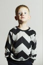 Funny shock face child in sweater.children trend.little boy.emotion Royalty Free Stock Photo