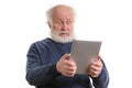 Funny shocked old man using tablet computer isolated on white