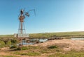 A funny sign on a broken windmill near Vredenburg in the Western Cape Province