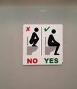 Funny sign on a toilet stall in Cologne, Germany