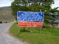 Funny sign with too much information and a lot of stickers. Road to applecross bealach na ba shieldaig kenmore hairpin .