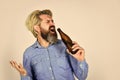 funny singer. beer and football. relax after working day. lets have fun. bearded man has hangover. mature man drink beer