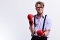 Funny skinny boxer man in glasses isolated over white background, Royalty Free Stock Photo