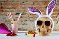 Funny skull with hair hoop in shape of rabbit ears and carnival accessories set. Decoration for party 1 April day or Mexican Day