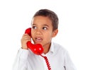 Funny small child talking on the phone Royalty Free Stock Photo