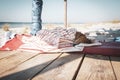 Funny small dog sleeps under a blanket, lying on the bungalow Royalty Free Stock Photo