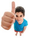 Funny small hispanic boy doing a thumbs up sign