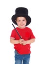 Funny small magician with a top hat and a magic wand Royalty Free Stock Photo