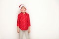 Funny smiling child boy in Santa red hat Royalty Free Stock Photo