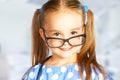 Funny smiling child girl in glasses Royalty Free Stock Photo