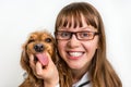 Funny smiling dog with tongue and smiling veterinarian Royalty Free Stock Photo