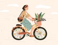 Funny smiling girl dressed in stylish clothes riding bicycle with flower bouquet in front basket. Cute happy young woman Royalty Free Stock Photo