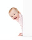 Funny smiling girl look out of wall Royalty Free Stock Photo