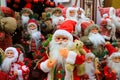 Funny smiling Santa Claus, a lot of favorite beautiful New Year and Christmas toys, many decorations and gifts, the best positive