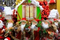 Funny smiling Santa Claus, a lot of favorite beautiful New Year and Christmas toys, many decorations and gifts, the best positive