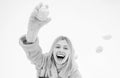 Funny smiling young woman in wintertime outdoor. Wearing funny hat plaid scarf and coat. Happy winter fun woman. Winter Royalty Free Stock Photo