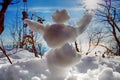 funny snowman in rays of sun Royalty Free Stock Photo