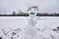 Funny snowman wearing a medical face mask Royalty Free Stock Photo