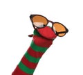 Funny sock puppet with sunglasses isolated on white