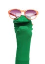 Funny sock puppet with sunglasses isolated on white