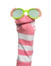 Funny sock puppet with sunglasses isolated on white