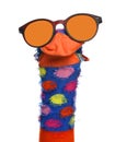 Funny sock puppet with sunglasses isolated on white