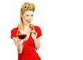 Funny sommelier woman tasting red wine. Young woman with glass of red wine. Funny woman drinking red wine over white