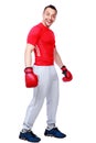 Funny sportsman in boxing gloves standing