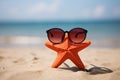 Funny starfish with sunglasses at sand beach Royalty Free Stock Photo