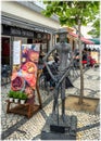 Funny statue near the cafe in Aveiro, Portugal