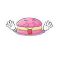Funny strawberry macarons mascot design with Tongue out