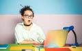 Funny student girl in classroom. Portrait of a excited surprised female student.